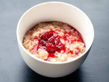 Vegan Toasted Oatmeal With Maple Syrup, Cranberries, And Raspberries