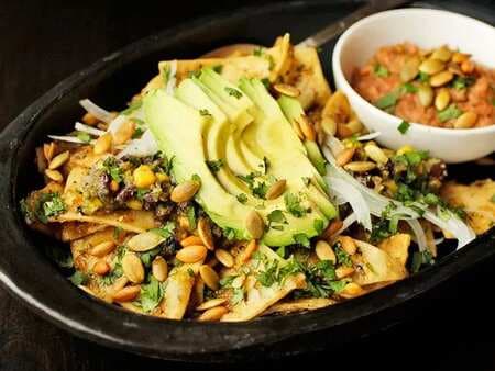 Chilaquiles With Pepitas, Charred Corn, And Black Beans