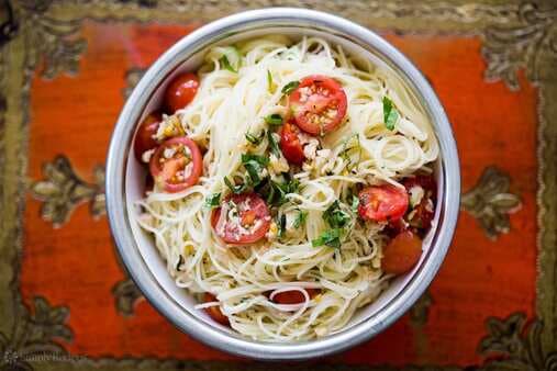 Angel Hair Pasta With Clams, Cherry Tomatoes, And Basil