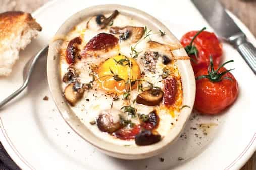 Baked Eggs With Spinach Mushrooms Goat's Cheese And Chorizo