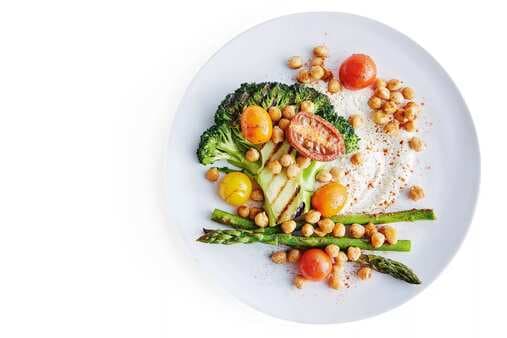 Broccoli Steaks With Roasted Chickpeas Tomatoes And Cashew Dressing