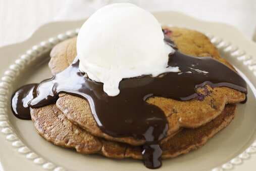 Chocolate And Mixed Berry Pancakes With Chocolate Sauce