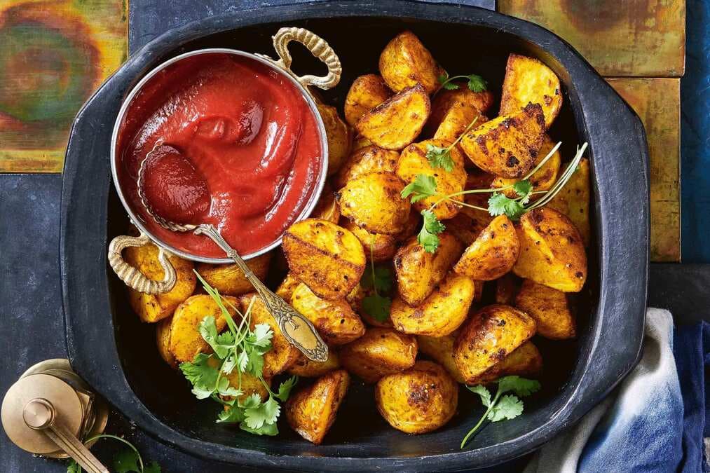 Curried Potatoes With Spicy Tomato Sauce