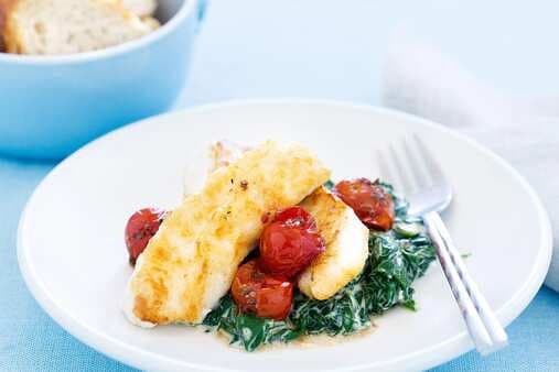 Fish With Creamed Spinach And Tomatoes