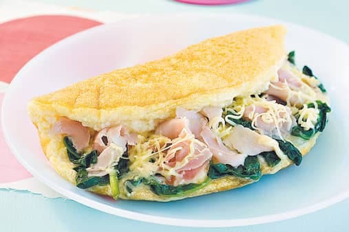 Fluffy Omelette With Ham Spinach And Swiss Cheese