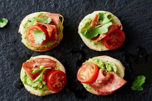 Guacamole Tomato And Spicy Salami Blinis