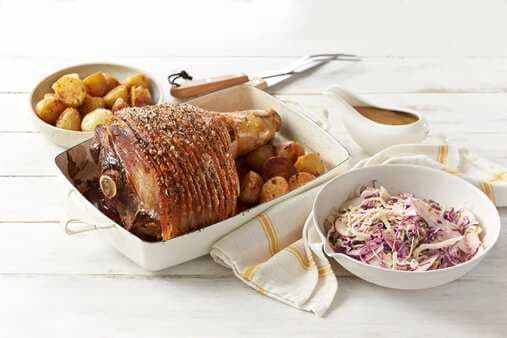 Pork Leg Roast With Cabbage And Apple Salad Baby Chat Potatoes And Gravy