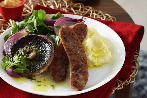 Pork Sausages With Mushrooms And Herb Butter