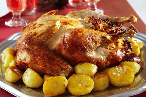Roast Turkey With Capsicum Almond And Rice Stuffing