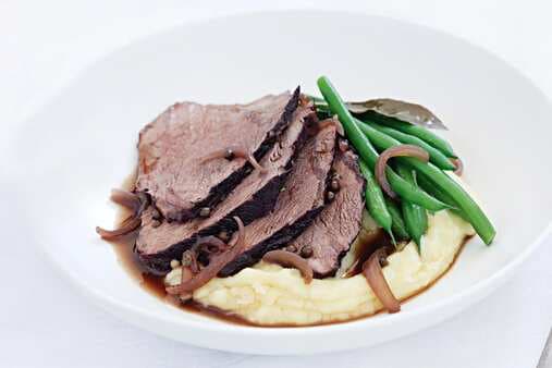 Slow-Cooked Beef With Red Wine And Peppercorn Sauce