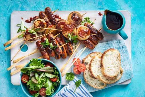 Smoky Barbecue Snags With Whisky-Spiked Onion Skewers