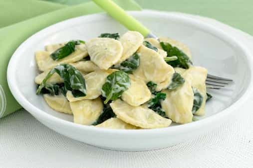 Spinach And Ricotta Agnolotti With Creamy Cheese Sauce