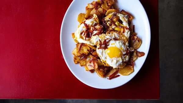 Fried Eggs With Chorizo And Fried Potatoes