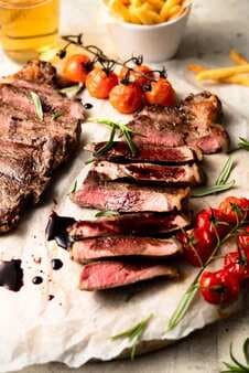 Seared New York Strip Steak With Red Wine Balsamic Reduction