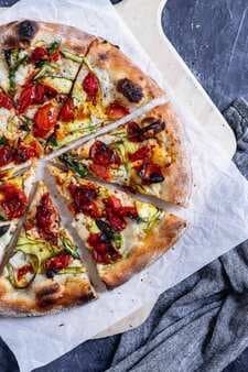 Vegan Pizza Primavera With Zucchini, Asparagus, And Burst Cherry Tomatoes