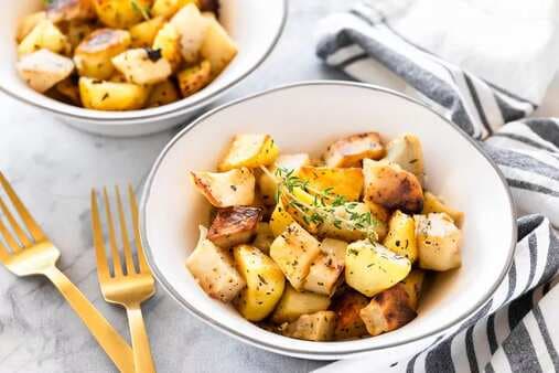 Roasted Potatoes With Basil Thyme And Garlic