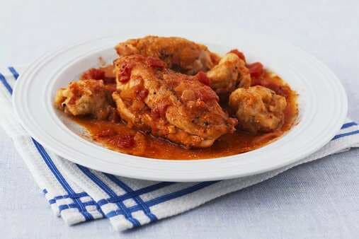 Chicken Stewed In Paprika And Cayenne Pepper Sauce