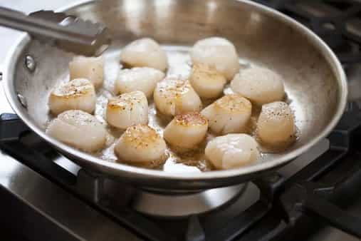 Creamy Risotto With Pan-Seared Scallops And Sausage